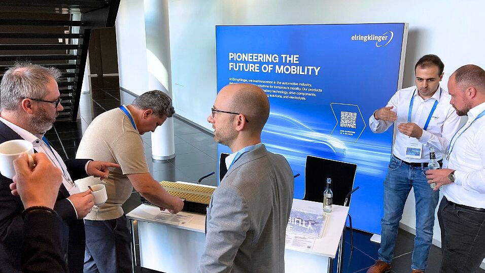 Attendees in front of the elringklinger Exhibition booth  at The Automotive Battery – Key Technology for Electric Vehicles 9th - 10th July 2025