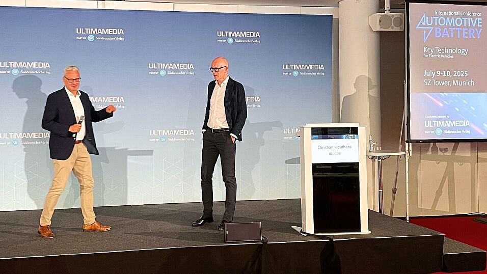 Chairman Peter Gresch talking to Christian Kleinhans on stage at The Automotive Battery – Key Technology for Electric Vehicles 9th - 10th July 2025