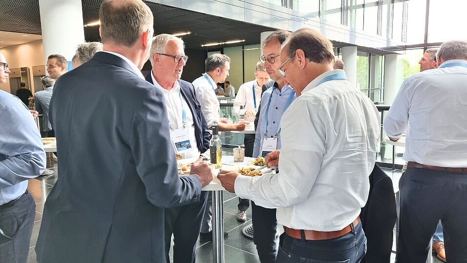 Attendees talking and enjoying their lunch break at The Automotive Battery – Key Technology for Electric Vehicles 9th - 10th July 2025